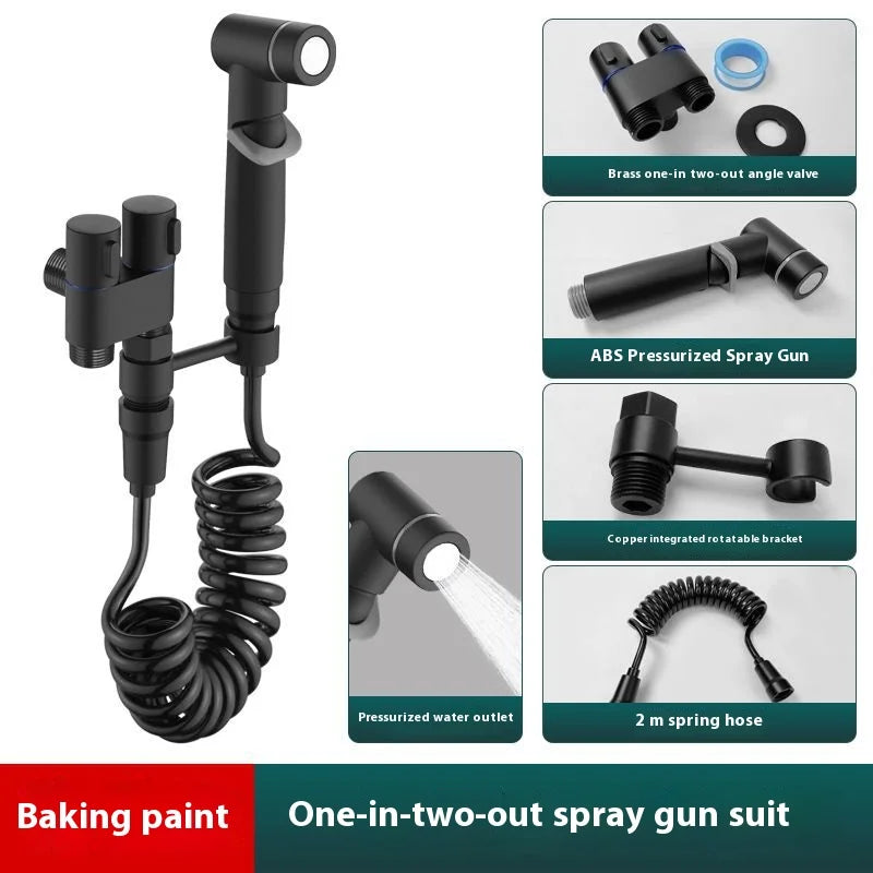 Spray gun with coiled hose and multiple components on a white background