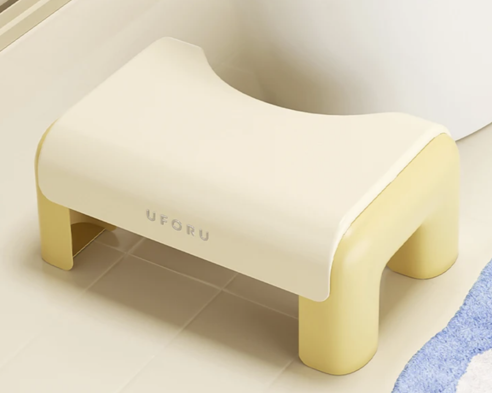 Beige step toilet stool with 'UFORU'