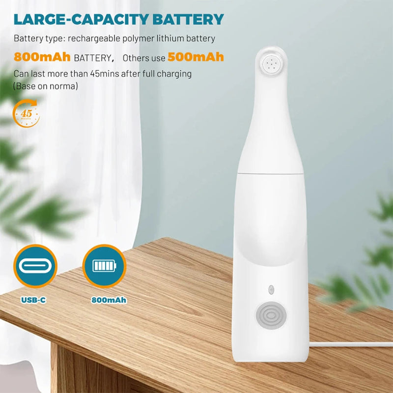 White electronic device on a wooden surface with battery information displayed.
